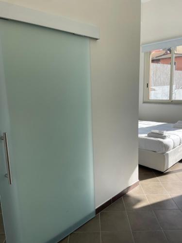 Cama o camas de una habitación en V&G palma di montechiaro