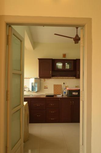 Una cocina o cocineta en 2BHK City View Calicut