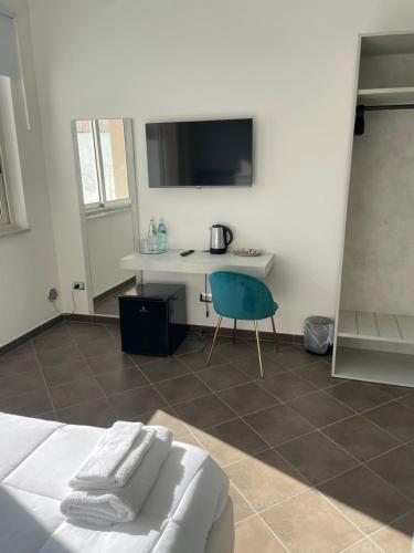 Cama o camas de una habitación en V&G palma di montechiaro