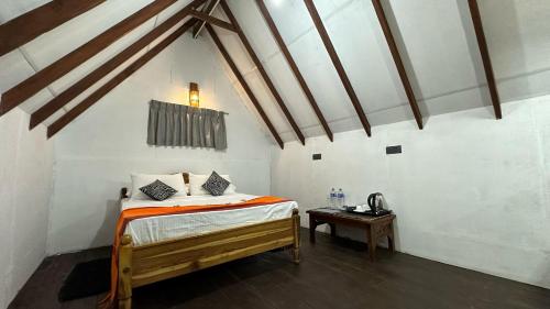 Postel nebo postele na pokoji v ubytování Sigiri Veenus Paradise
