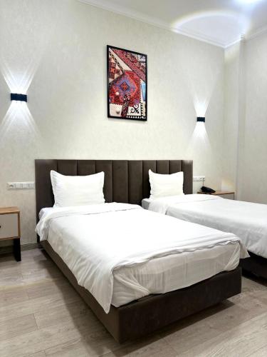 Letto o letti in una camera di Hotel 1946