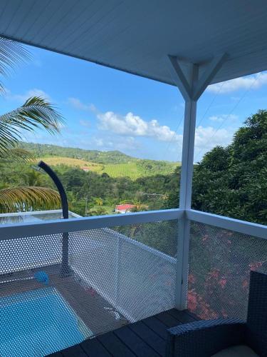 a view from the balcony of a house at Le domaine de Périolat in Le François