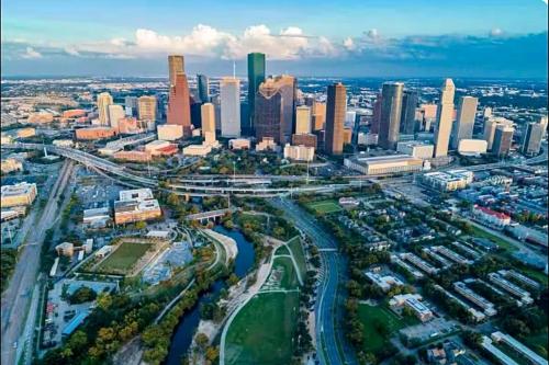 an aerial view of a city with many tall buildings at Grand Luxé Retreat - Lavish Abode - Free Parking - Near Med Center & NRG in Houston