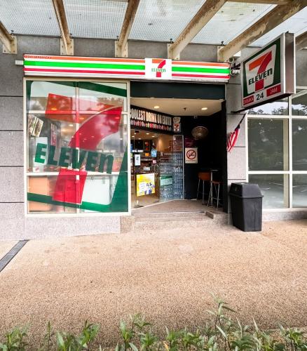 a store front with a sale sign in the window at KidsVille Slide PlayNest at Afiniti, Walking to Legoland JB, Johor, Malaysia in Iskandar Puteri
