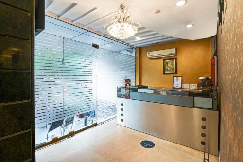 Kuchyň nebo kuchyňský kout v ubytování New Ammby Inn - Lajpat Nagar