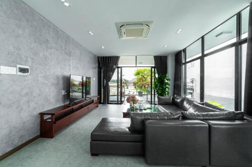 Posezení v ubytování Villa Nguyên Căn 8 Phòng Ngủ View Biển