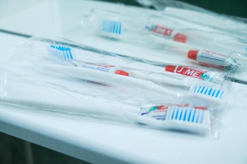 a group of toothbrushes on a shelf in a store at Назарбаева 31 шикарное жилье in Karagandy
