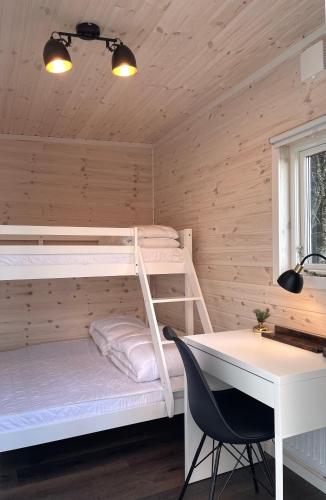 Ένα ή περισσότερα κρεβάτια σε δωμάτιο στο Dreamy House w. private dock by the Baltic sea