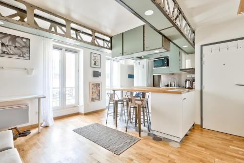 Photo de la galerie de l'établissement Lovely studio 5 mn walk to Laumière metro station, à Paris