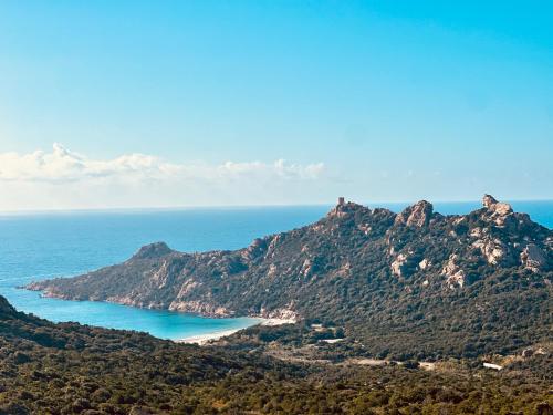 an island in the middle of the ocean at Hotel Restaurant L'Europe in Saint-Florent