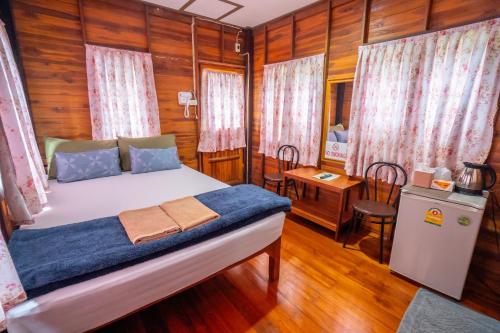 Katil atau katil-katil dalam bilik di Ban Suan Bang Toei Homestay