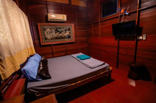Katil atau katil-katil dalam bilik di Ban Suan Bang Toei Homestay