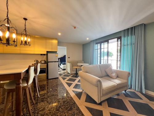 Et opholdsområde på Espana Jomtien Pattaya By Thita