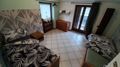 Ένα ή περισσότερα κρεβάτια σε δωμάτιο στο Casa Felice