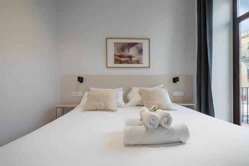 Кровать или кровати в номере Happy Apartments