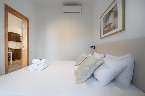 Кровать или кровати в номере Happy Apartments