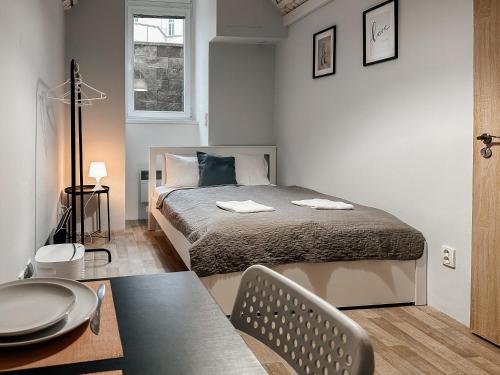 Postel nebo postele na pokoji v ubytování ELSO apartments