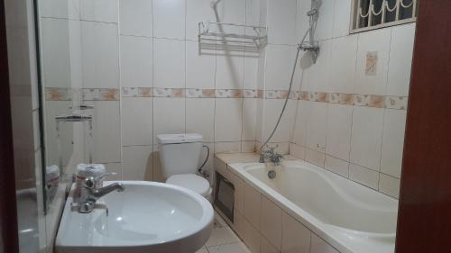 Koupelna v ubytování New JBK Hotel