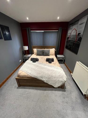 a bedroom with a large bed in a room at In the heart of Inverness in Inverness