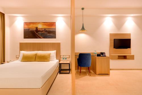 Postel nebo postele na pokoji v ubytování Keys Prima by Lemon Tree Hotels, Katti-Ma, Chennai