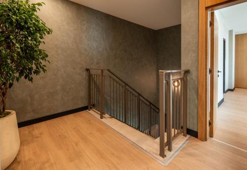 a staircase in a house with a plant at Ethno Belek in Belek