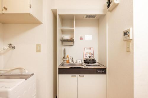 Dapur atau dapur kecil di アンドステイ松原2丁目b