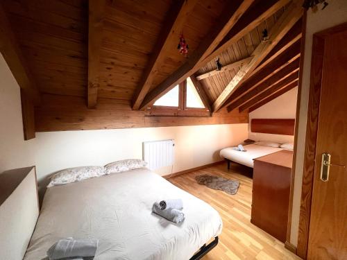 Postel nebo postele na pokoji v ubytování Dúplex d'Ainet - Vall de Cardós - L'Amfitriona