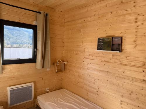 Postel nebo postele na pokoji v ubytování Petit Chalet neuf avec jardin - La montagne Sud