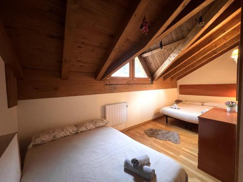 Postel nebo postele na pokoji v ubytování Dúplex d'Ainet - Vall de Cardós - L'Amfitriona