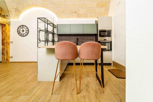 A kitchen or kitchenette at Il Melograno - Suite Deluxe