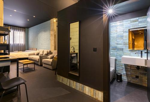 Katil atau katil-katil dalam bilik di Apartamentos HEY U