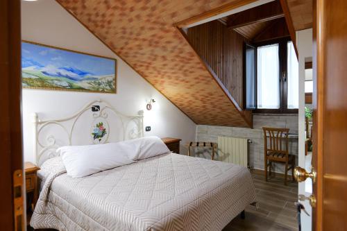 Postel nebo postele na pokoji v ubytování Hotel Bamby