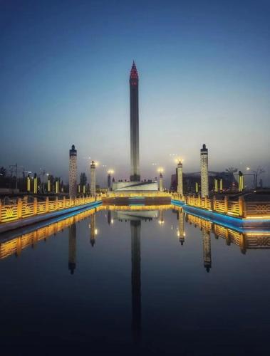 a view of a monument in a city at night at Sandbank Dream in Fengdeng