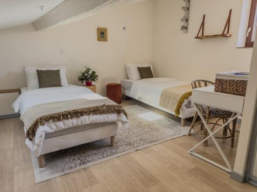 Postel nebo postele na pokoji v ubytování Duplex lumineux 2 chambres centre zone piétonne