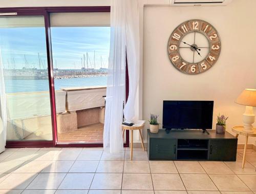 Posezení v ubytování Voile de Mer 1 - Les Pieds dans l'eau, CLIM, Wifi, 2 personnes