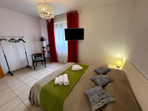 Postel nebo postele na pokoji v ubytování Casa SAFFI