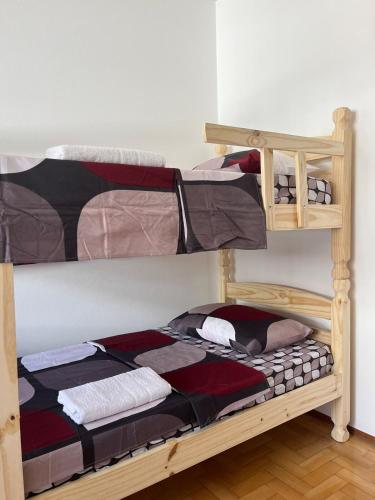 Ένα ή περισσότερα κρεβάτια σε δωμάτιο στο 101- Apartamento 2 quartos próximo UFN, com vaga de garagem