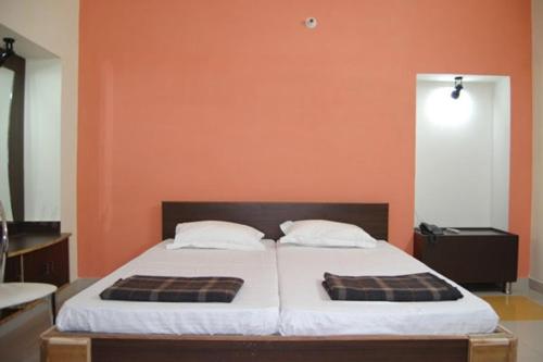 Katil atau katil-katil dalam bilik di Polo inn guest house