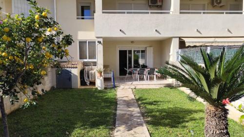 Apartamento, jardín privado, perfecto para tus vacaciones