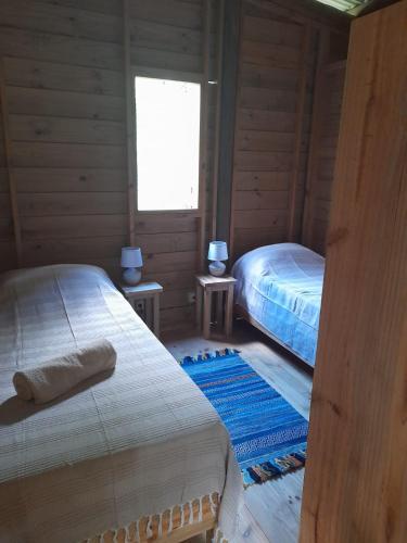 Postel nebo postele na pokoji v ubytování Laferm Coco