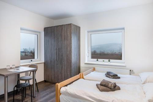 Postel nebo postele na pokoji v ubytování Haus Fuldablick