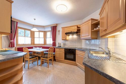 Kuchyň nebo kuchyňský kout v ubytování Landhaus Winkl