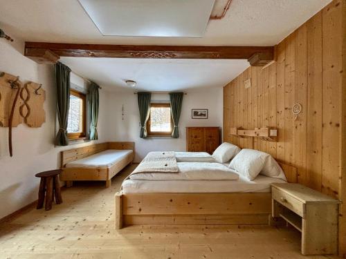 A bed or beds in a room at Ferienhaus Marie