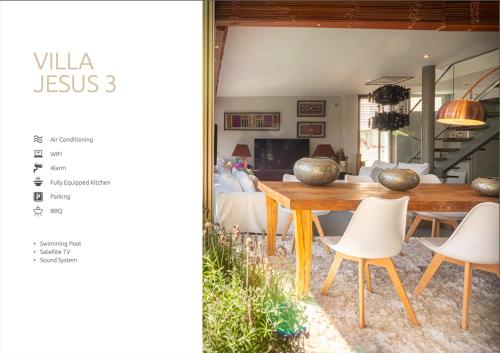 a dining room with a table and chairs at Casa Onix Ibiza in Ibiza Town