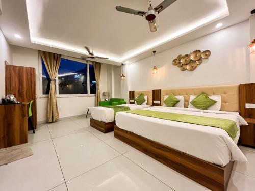 Katil atau katil-katil dalam bilik di Wanna Stay Rishikesh