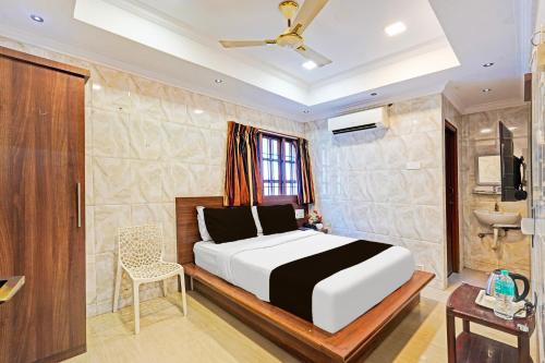 Postel nebo postele na pokoji v ubytování Super Hotel O Triplicane formerly Park Royal
