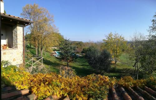 a view of a garden from the roof of a house at Agriturismo Casa Greppo in San Venanzo