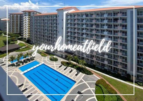 Πισίνα στο ή κοντά στο Your HOME At Field Residences