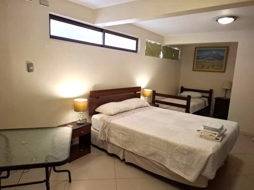 Cama ou camas em um quarto em Hostal Anpaymi Atacama