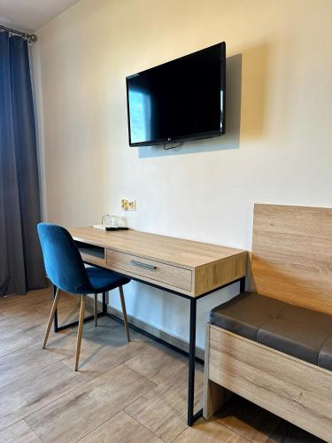 TV a/nebo společenská místnost v ubytování Gościniec Paradise